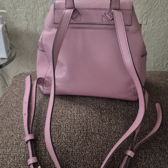 Elegant Pink Leather Backpack with Tassels